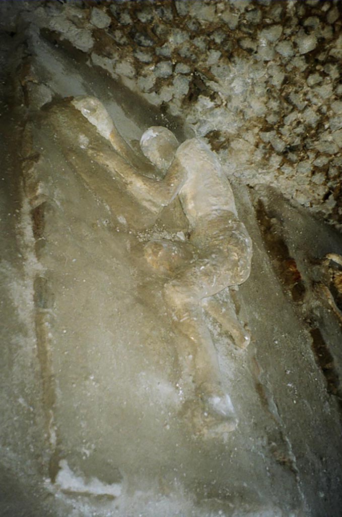 Pompeii, outside Porta Nocera. July 2010. 
Plaster cast of a third fleeing victim 32 found on 16th March 1957. Photo courtesy of Rick Bauer. 

