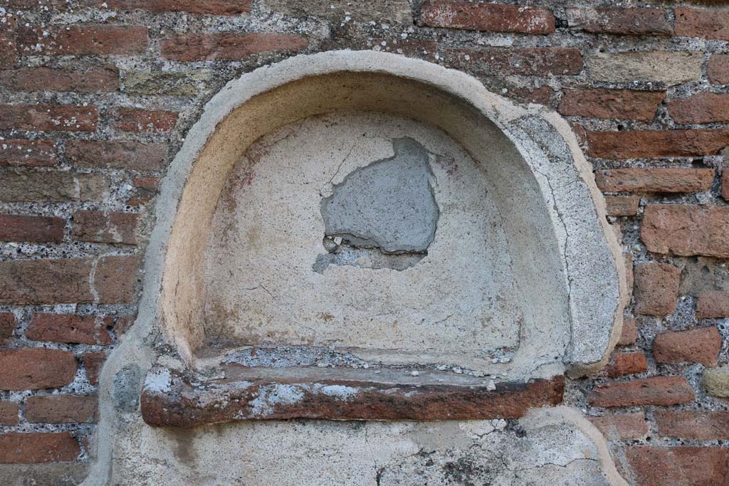 VIII.3.14, Pompeii. December 2018. Detail of arched niche set into north wall of kitchen. Photo courtesy of Aude Durand.