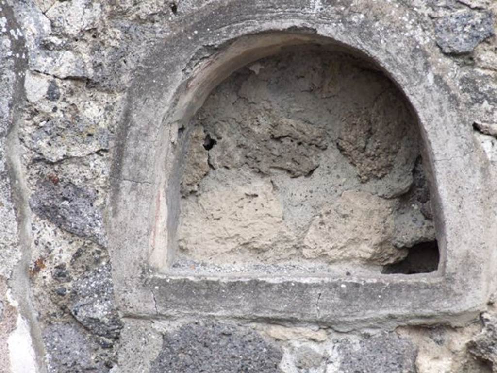 IX.1.15/16 Pompeii. December 2007. Arched niche on east wall.
According to Boyce –
In the east wall is an arched niche (h.032, w.0.35, d.0.12, h. above floor 1.35).
See Boyce G. K., 1937. Corpus of the Lararia of Pompeii. Rome: MAAR 14. (p.79, no. 384). 


