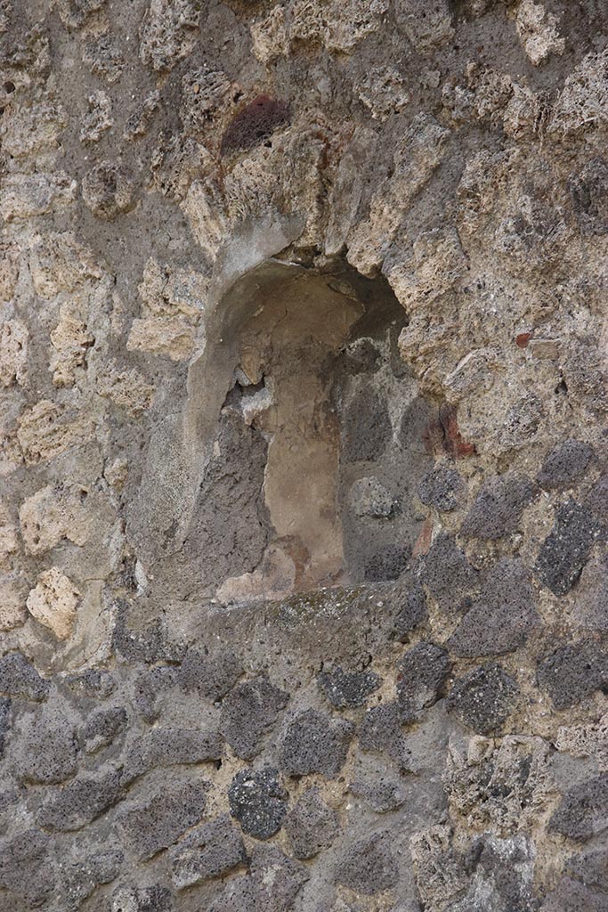 I.2.3 Pompeii. October 2024. 
Niche on south wall of atrium, at west end. Photo courtesy of Klaus Heese.


