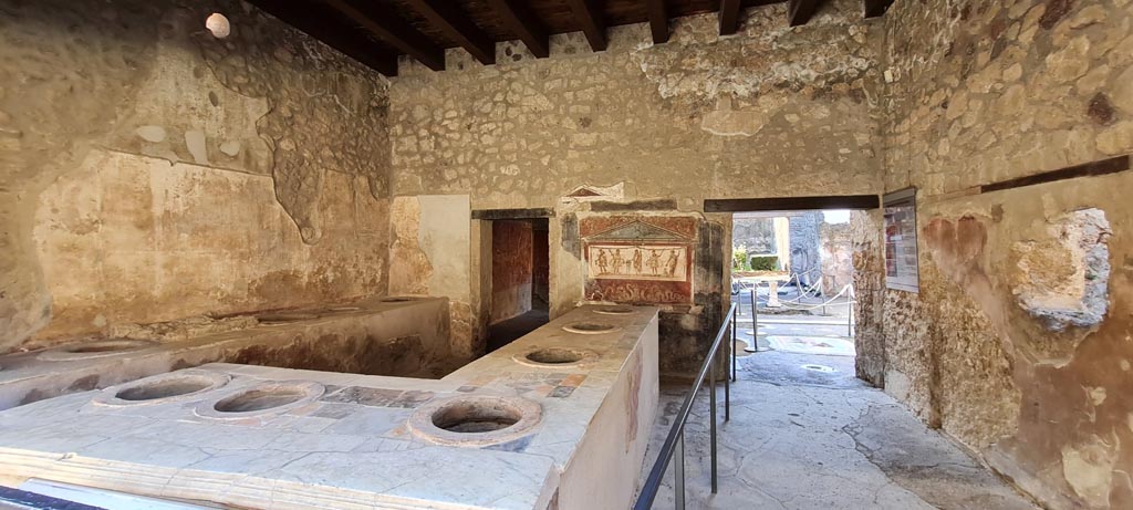 I.8.8 Pompeii. April 2022. Looking south across bar-room. Photo courtesy of Giuseppe Ciaramella.