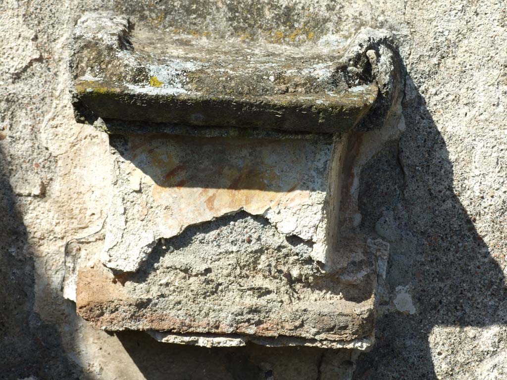 VI.16.12 Pompeii. March 2009. Masonry altar on north wall. According to Boyce, the altar was painted to represent coloured marble. 
Painted above it on the wall were a pine cone, egg and fruit.
See Boyce G. K., 1937. Corpus of the Lararia of Pompeii. Rome: MAAR 14.  (No.223, p58, Pl.28, 1)
