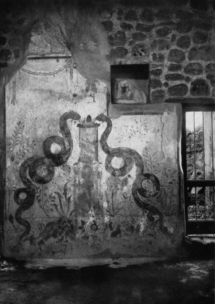 VI.16.15 Pompeii. pre-1937. 
North wall of atrium with lararium between doorways to room I (left) and rooms K to M (right).
See Boyce G. K., 1937. Corpus of the Lararia of Pompeii. Rome: MAAR 14. (p.58, no.224, Pl.16,1) 
