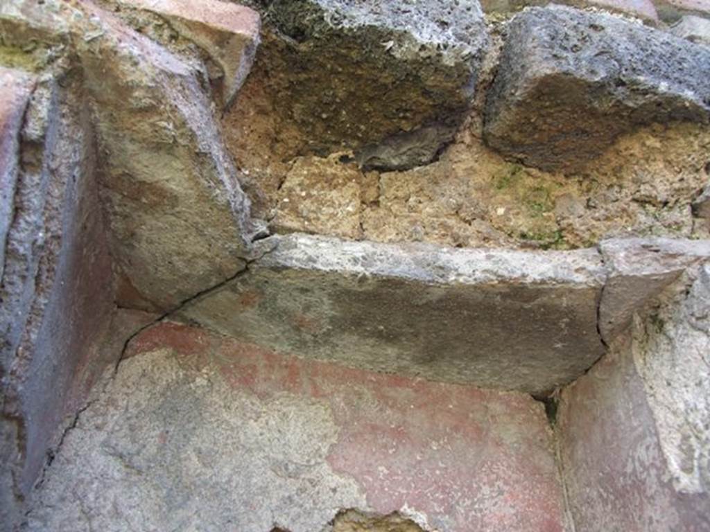 VI.16.20 Pompeii.  March 2009.  Top of niche, with remains of painted decoration.