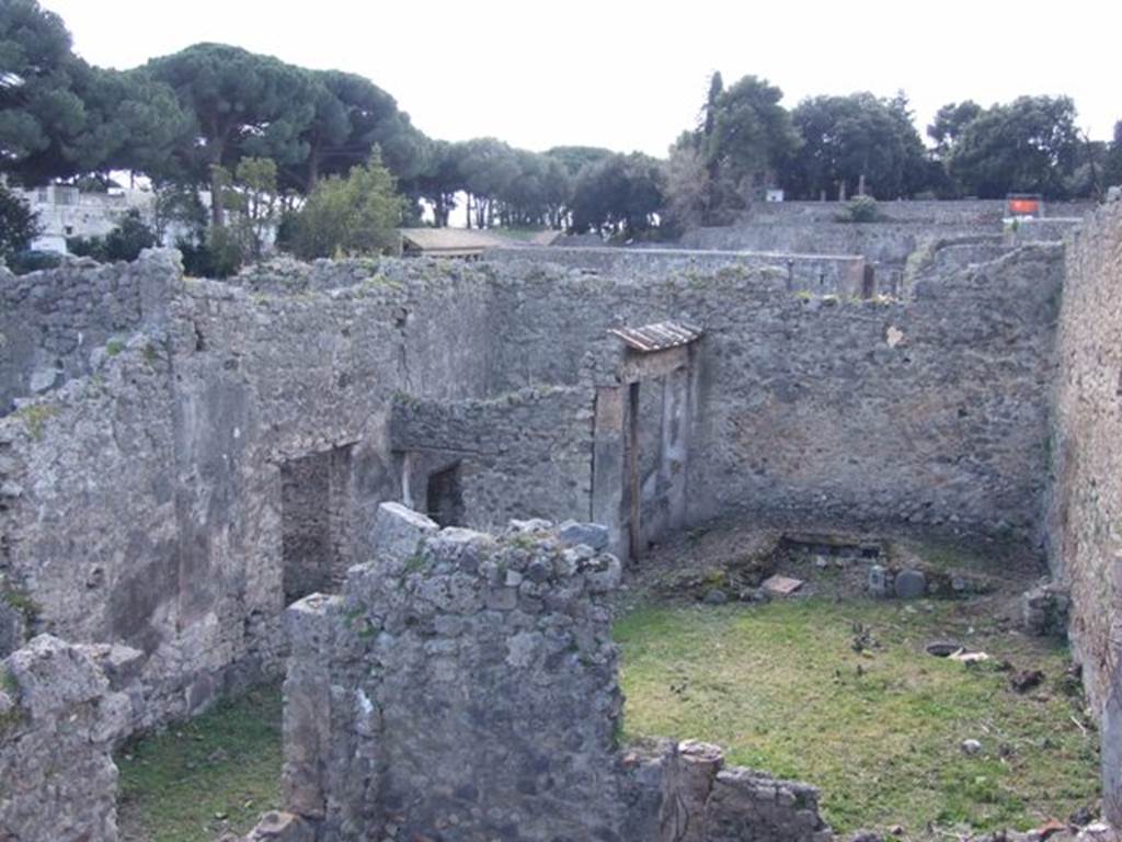 I.2.28 Pompeii.  March 2009.  Looking west towards Garden Triclinium, and room with window overlooking it.  Taken from I.2.20.