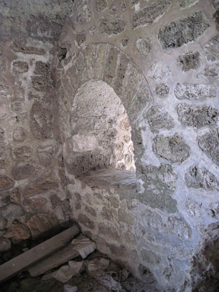 I.3.3 Pompeii. September 2010. South-west corner of other storeroom, showing reverse of window through to kitchen. Photo courtesy of Drew Baker.
