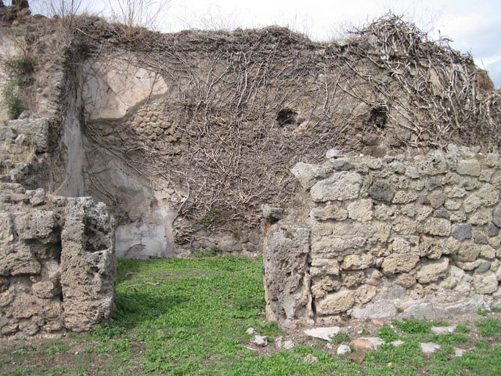 I.3.3 Pompeii. September 2010.  Upper peristyle area, looking north to doorway to another oecus, which Fiorelli described as “occupying nearly all of the left (north) side of the peristyle”. Photo courtesy of Drew Baker.
