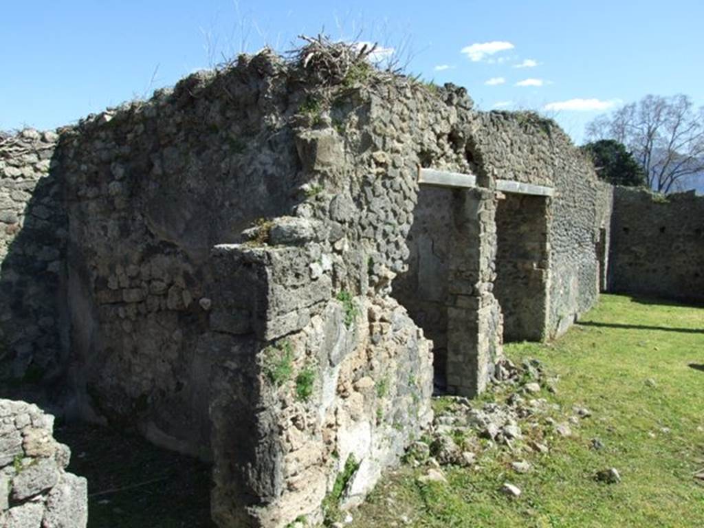 1.3.3 Pompeii. March 2009.  Four rooms with doorways onto east portico of upper peristyle level. Looking south.
