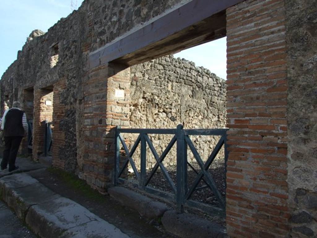 I.3.15 Pompeii. December 2007. Entrance on Vicolo del Menandro. 
Written in black, on the right of the entrance, was the following painted graffito which gave the name of the “fullone”:
Sestius  Venustus  (rogat)    [CIL IV 1082]
See Della Corte, M., 1965.  Case ed Abitanti di Pompei. Napoli: Fausto Fiorentino. (p. 266)

According to Pagano & Prisciandaro, the graffito was written
Segius  Venustus
Ofnoedn        [CIL IV 1082]
See Pagano, M. and  Prisciandaro, R., 2006. Studio sulle provenienze degli oggetti rinvenuti negli scavi borbonici del regno di Napoli.  Naples : Nicola Longobardi. (p. 169) 
