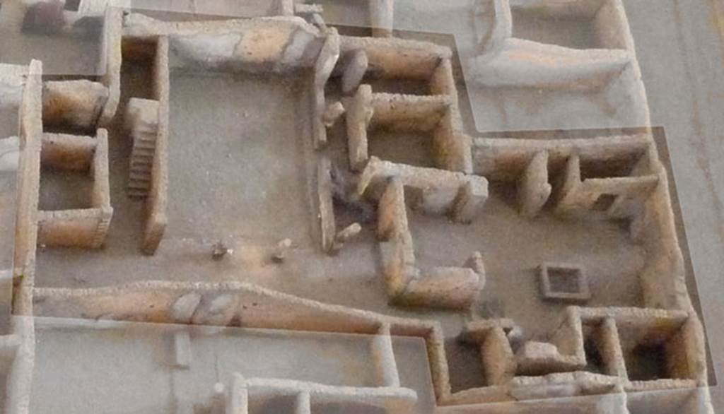 I.3.23 Part of the model of Pompeii. Now in Naples Archaeological Museum. The west rear wall of the peristyle can be seen at the centre top of photograph.