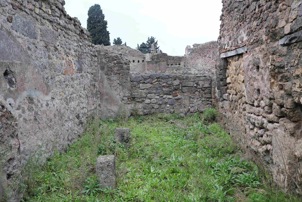 I.4.12 Pompeii. December 2018. Looking west across room on west side of oven. Photo courtesy of Aude Durand.