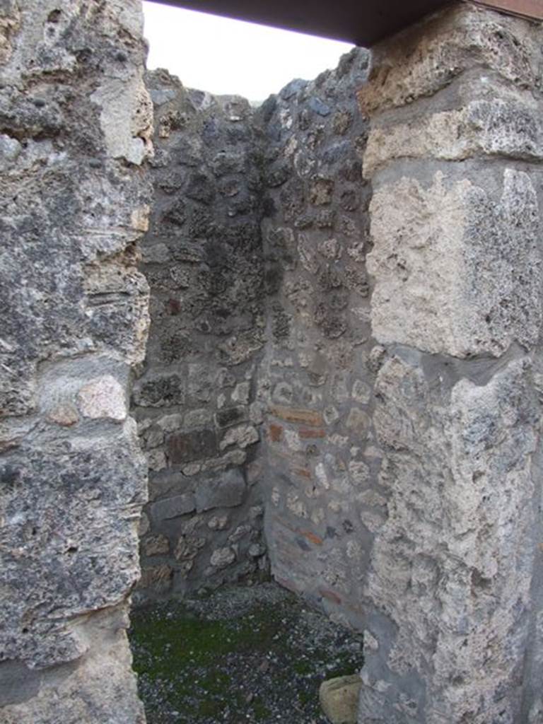 I.4.25 Pompeii. December 2007. 
Doorway to room 5, looking south into small room or ostiarius with two doorways. 
Photograph is taken from the fauces. The other door is in the west wall of the atrium. 
