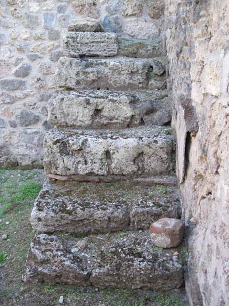 I.5.2 Pompeii. September 2010. Looking south at steps to upper floor in south-west corner of anteroom. Photo courtesy of Drew Baker.
