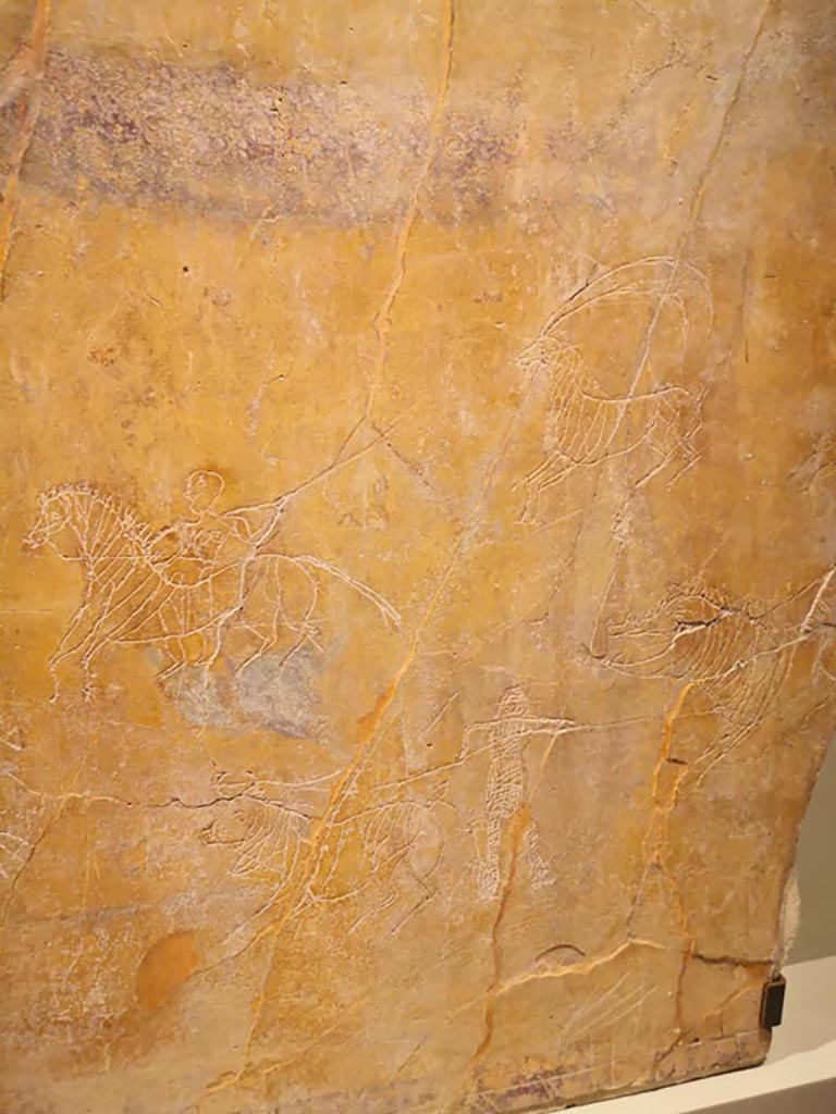 .6.2 Pompeii, December 2019. South wall of oecus, with graffiti.  
On display in exhibition “Pompei e Santorini” in Rome, 2019. Photo courtesy of Giuseppe Ciaramella.
