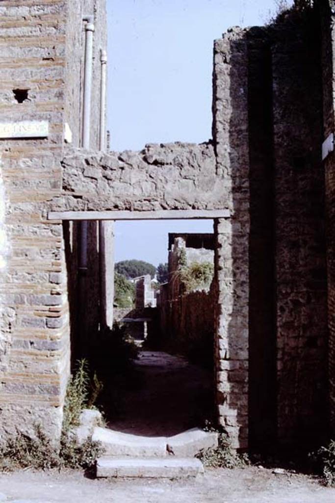 I.7.1, on left.  Looking south along Vicolo di Paquius Proculus. I.6.2 on right. Pompeii, 1968.  Photo by Stanley A. Jashemski.
Source: The Wilhelmina and Stanley A. Jashemski archive in the University of Maryland Library, Special Collections (See collection page) and made available under the Creative Commons Attribution-Non Commercial License v.4. See Licence and use details.
J68f0646
