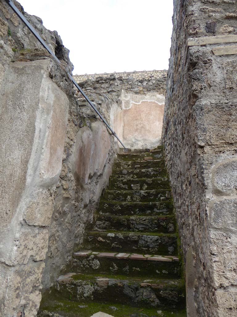 I.6.2 Pompeii. August 2021. Stairs to upper floor, on east side of atrium. Photo courtesy of Robert Hanson.