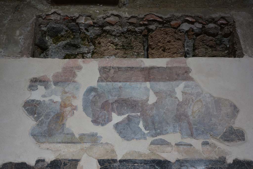 I.6.2 Pompeii. March 2019. Detail from upper centre of painted panel on north wall of north wing.
Foto Annette Haug, ERC Grant 681269 DÉCOR.
