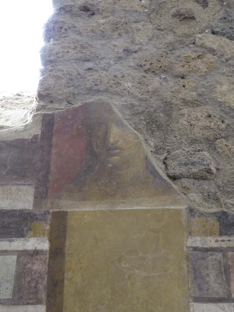 I.6.2 Pompeii. September 2017. 
Detail of painted face from upper east wall on south side of window at north end of cryptoporticus.
Foto Annette Haug, ERC Grant 681269 DCOR.
