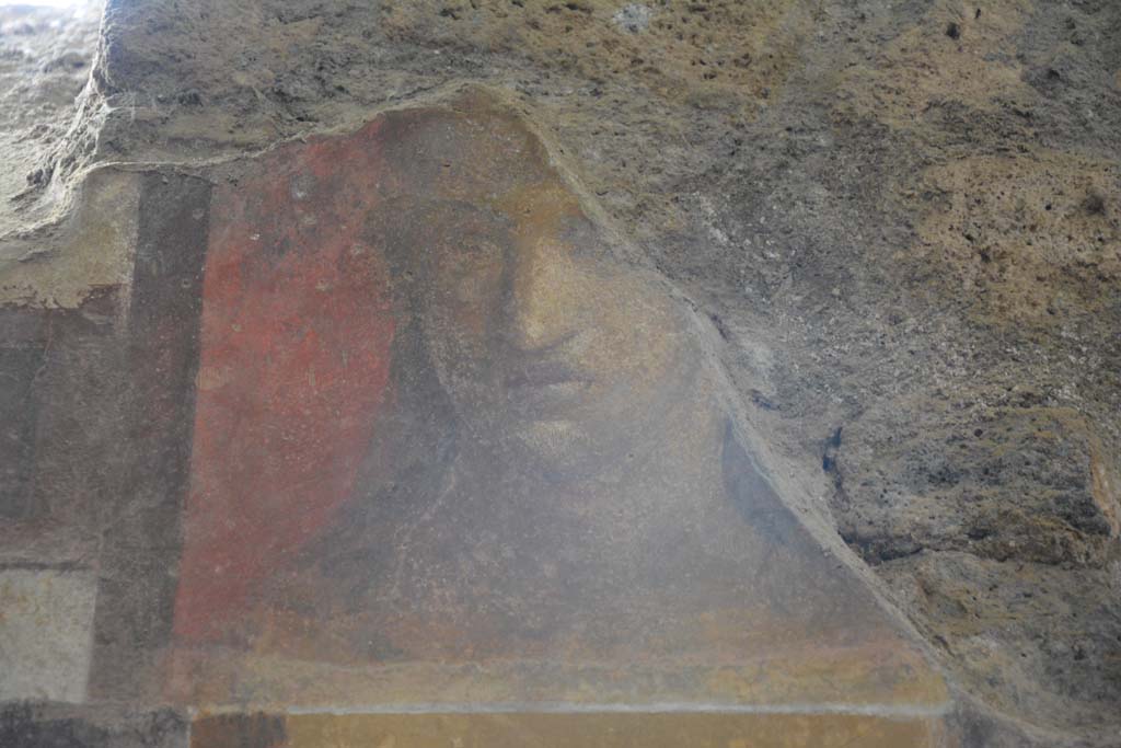 I.6.2 Pompeii. March 2019. Detail of painted face from upper east wall on south side of window at north end of cryptoporticus.
Foto Annette Haug, ERC Grant 681269 DCOR.
