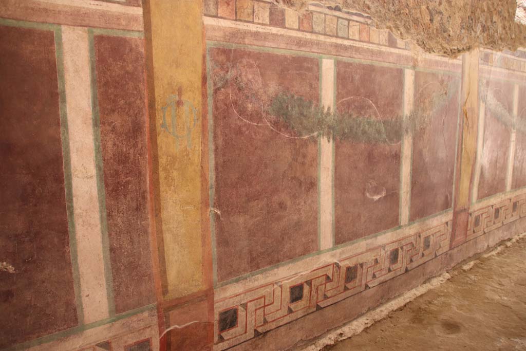 I.6.2 Pompeii. September 2019. Wall decoration on east wall of west wing of cryptoporticus, looking south.
Photo courtesy of Klaus Heese.

