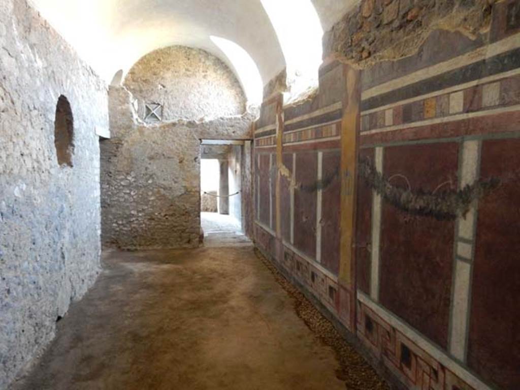 I.6.2 Pompeii. May 2016. 
Looking south towards doorway into oecus/triclinium along east wing of cryptoporticus. Photo courtesy of Buzz Ferebee.

