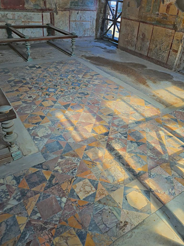 I.7.11 Pompeii. March 2024. Triclinium, marble opus sectile floor. Photo courtesy of Giuseppe Ciaramella.