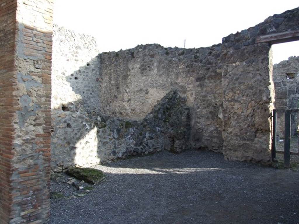 I.8.6 Pompeii. December 2007. East wall of shop, with site of stairs to upper floor.