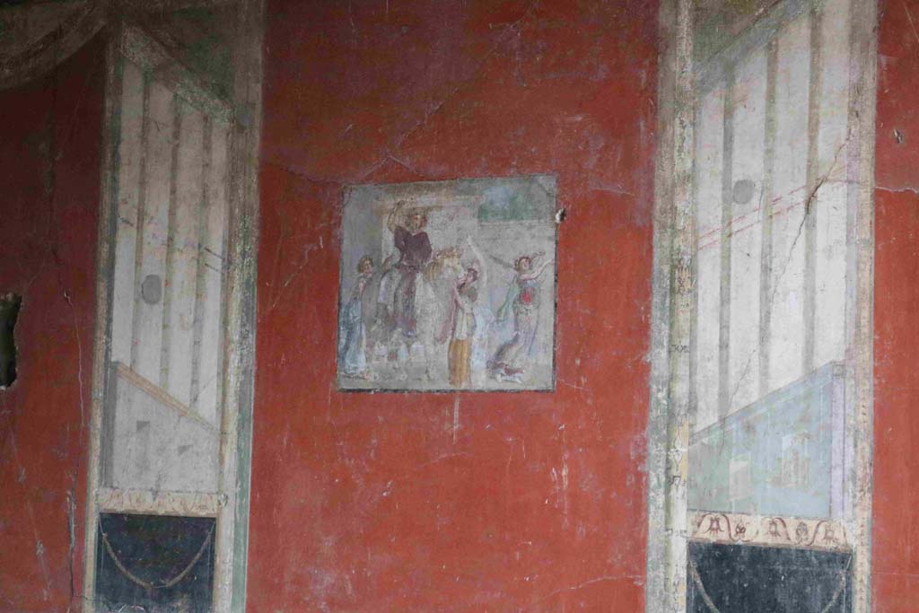 I.8.9 Pompeii. December 2018. Room 7, detail of central panel from east wall of triclinium. Photo courtesy of Aude Durand.

