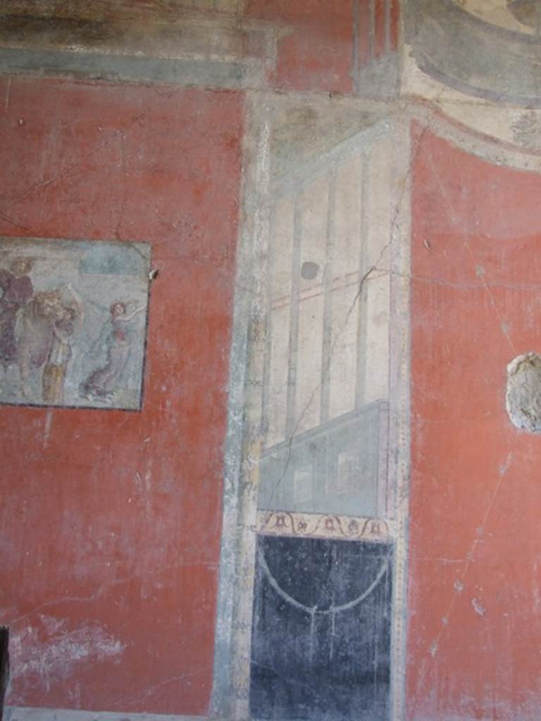 I.8.9 Pompeii.  March 2009. Room 7. Triclinium.  East wall. Lower level.  Architectural painting at south side of central panel.

