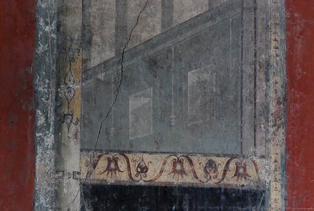 I.8.9 Pompeii. March 2008. Room 7, triclinium.  Lower part of east wall. Detail of architectural painting at south side of central panel. Photo courtesy of Nicolas Monteix.
