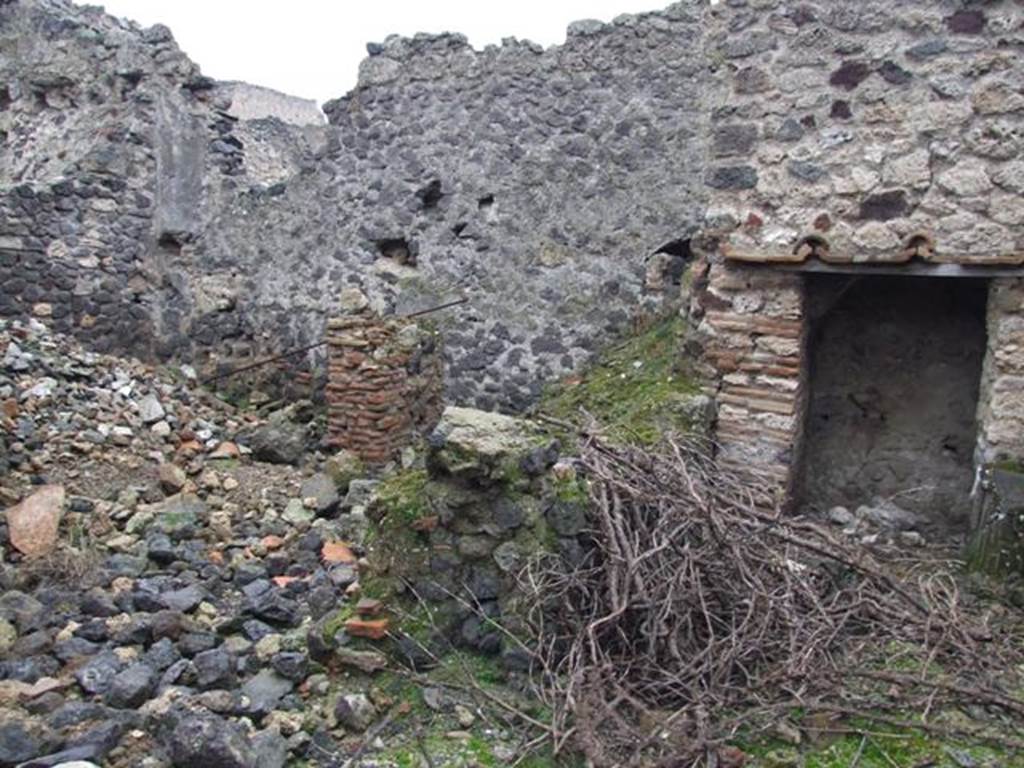 I.8.18 Pompeii. December 2007. Room under rubble in north-east corner of house with remains of staircase on the east wall.