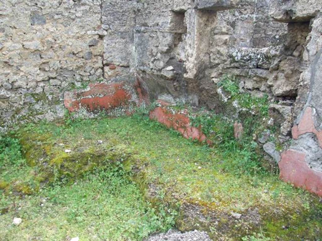 I.9.12 Pompeii.  March 2009.  Room 9.  Remains of Triclinium In south west corner of room.