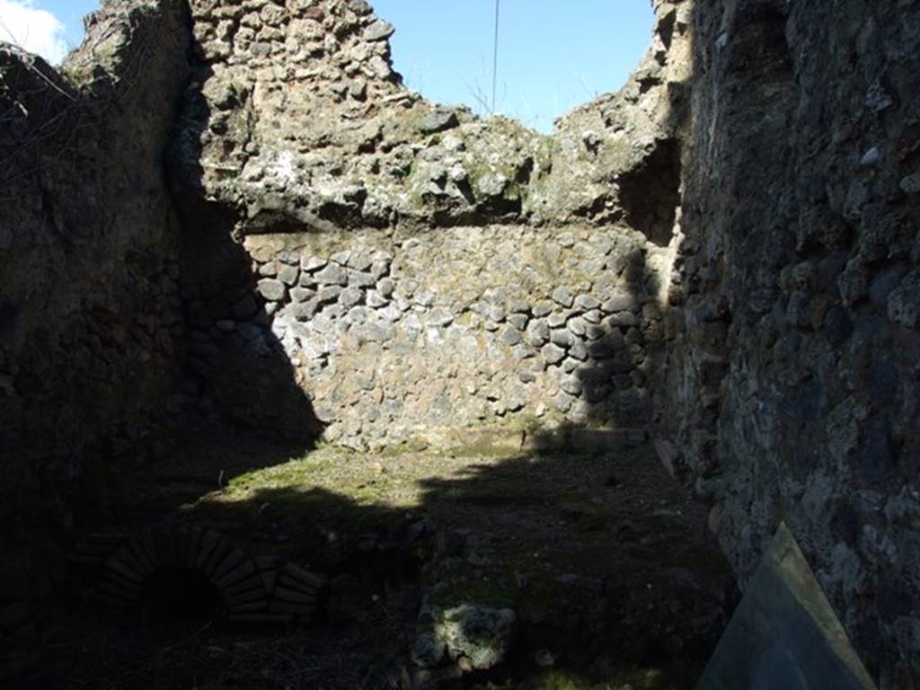 I.10.4 Pompeii. March 2009. Room 27, north wall with hearth. 

