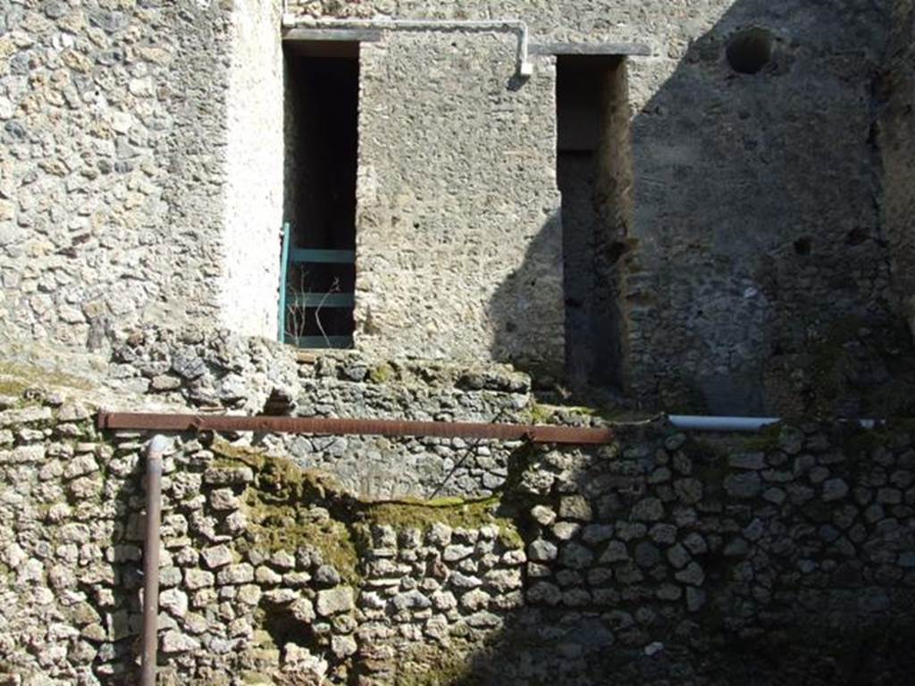 I.10.4 Pompeii. March 2009. Looking at rear wall of Baths area.