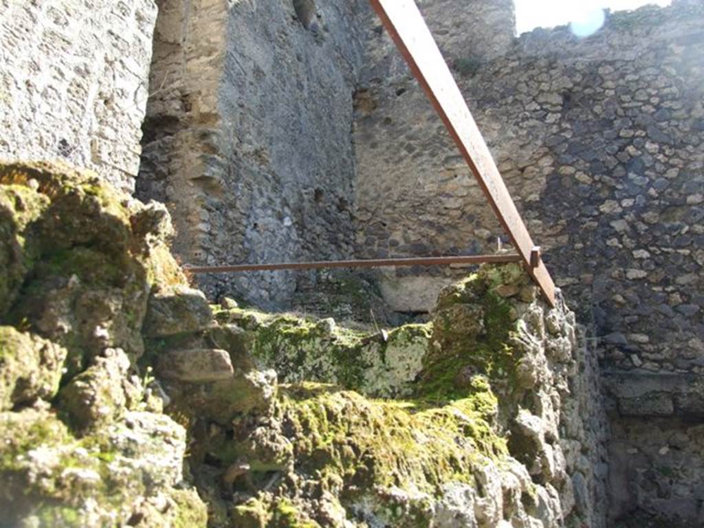 I.10.4 Pompeii. March 2009. Area S[50]. South east corner looking at rear of Baths wall.