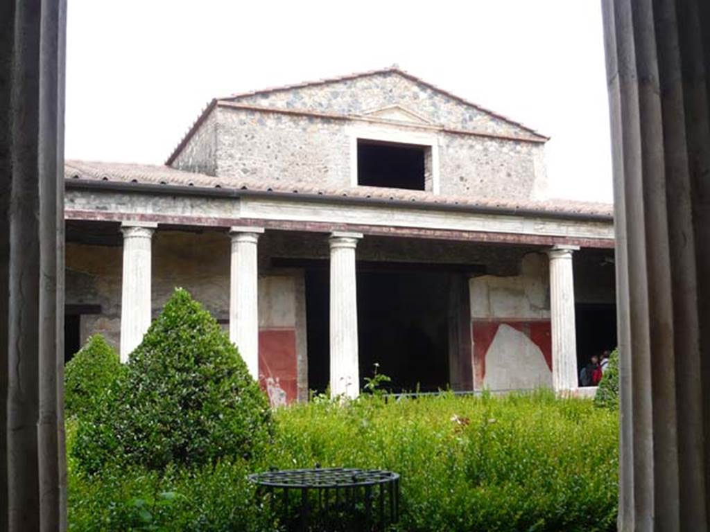 I.10.4 Pompeii. May 2012. Looking east across peristyle to entrance to room 18, centre.  Photo courtesy of Buzz Ferebee.
