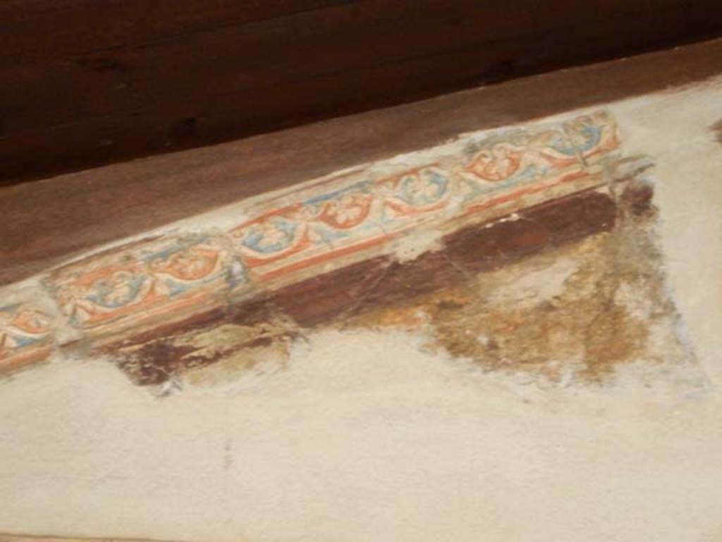 I.10.4 Pompeii. May 2015. Room 18, detail from ceiling pediment. Photo courtesy of Buzz Ferebee.