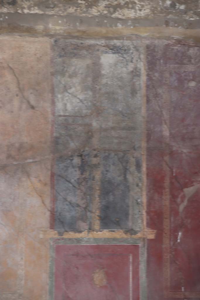 I.10.4 Pompeii. May 2006. Room 18, detail of painted panel from north side of east wall.