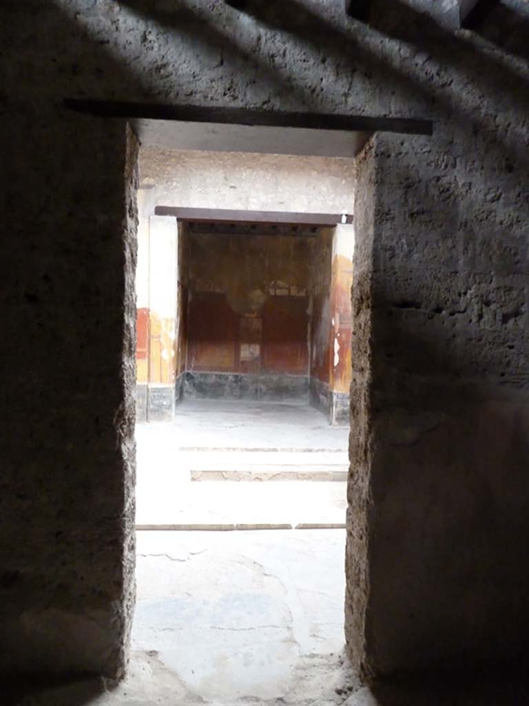 I.10.4 Pompeii. May 2010. Room 6, east wall with view across atrium to room 4.