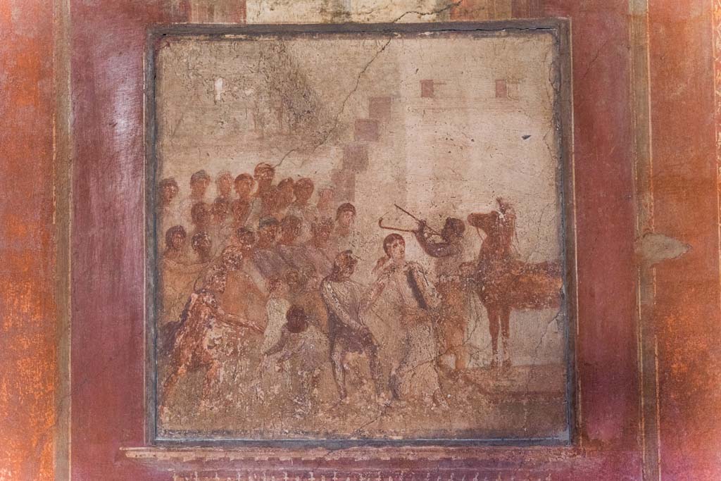 I.10.4 Pompeii. April 2022. 
Room 4, central panel on east wall with painting of Cassandra and the wooden Trojan horse.
Photo courtesy of Johannes Eber.
