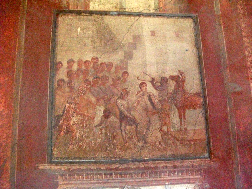 I.10.4 Pompeii. April 2022. 
Room 4, wall painting of Cassandra and the wooden Trojan horse from east wall. Photo courtesy of Johannes Eber.

