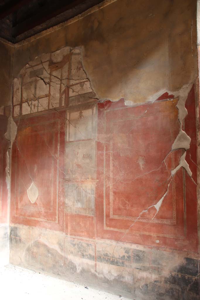 I.10.4 Pompeii. May 2006. Room 4, east wall, detail from wall below centre painting.