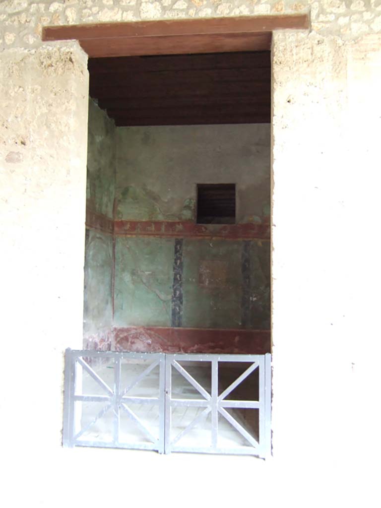 I.10.4 Pompeii. September 2021. 
Looking north from west portico towards doorway to room 11, in centre. Photo courtesy of Klaus Heese.
