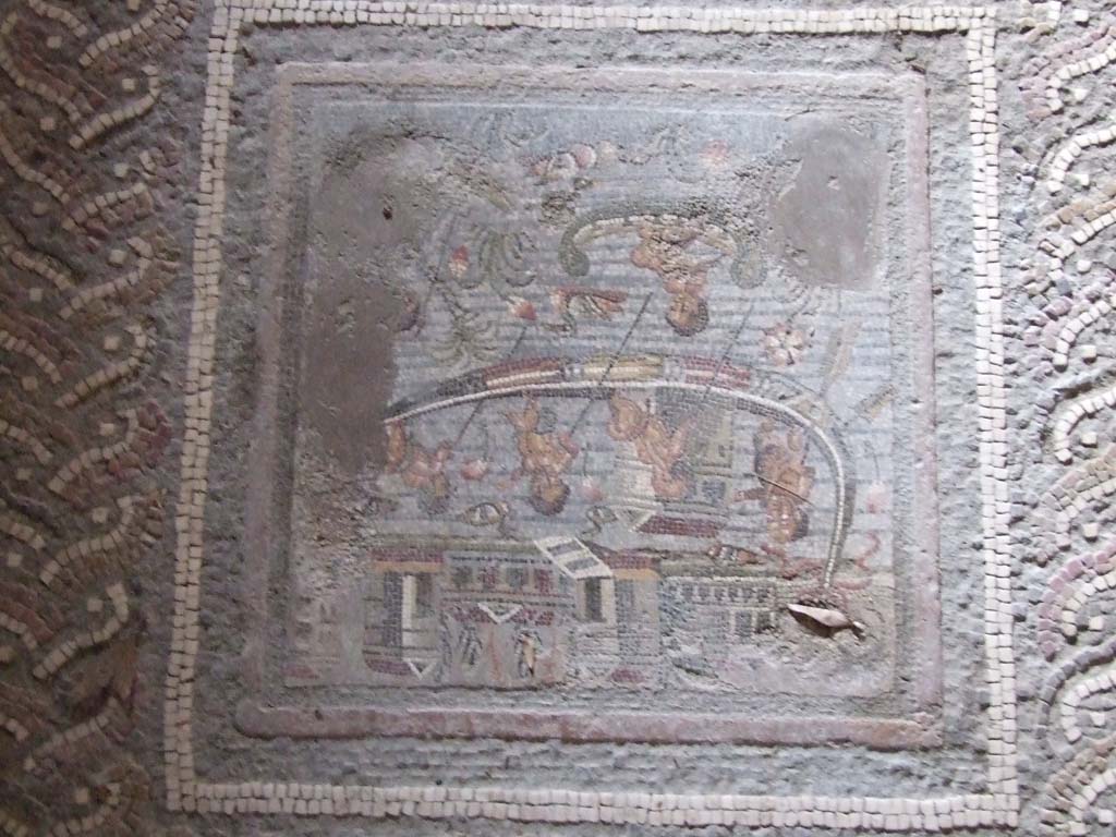 I.10.4 Pompeii. December 2018. 
Room 11, mosaic of pygmies in Nile scene in centre of mosaic floor. Photo courtesy of Aude Durand.
