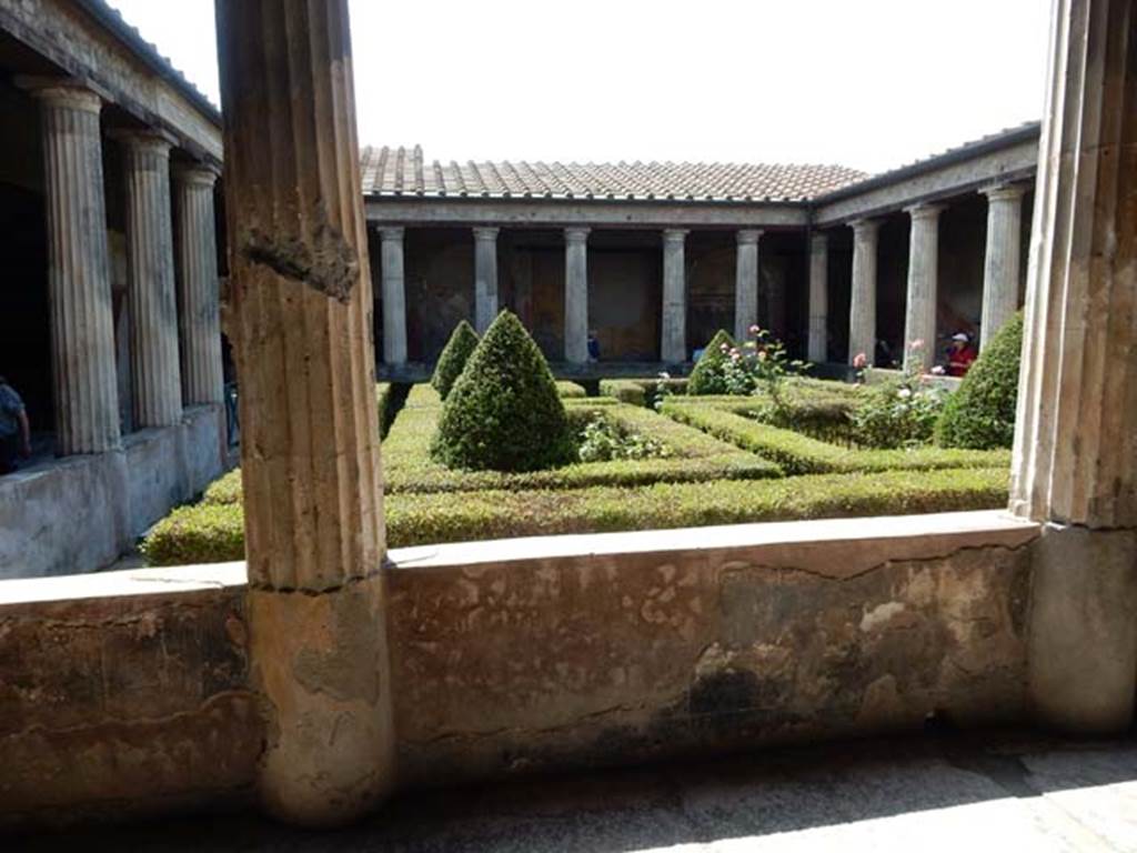 I.10.4 Pompeii. May 2017. Looking west across gutter on north side of peristyle garden from east portico. Photo courtesy of Buzz Ferebee.
