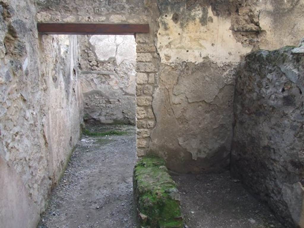 I.10.6 Pompeii.  Workshop.   December 2007. Small room to east of workshop, west wall and door to workshop.