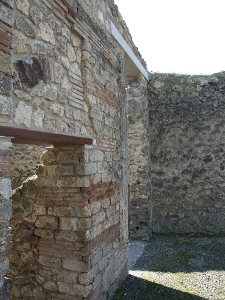 I.10.8 Pompeii. March 2009.  Doorway to corridor 7 to rear, and room 8 on west side of atrium.