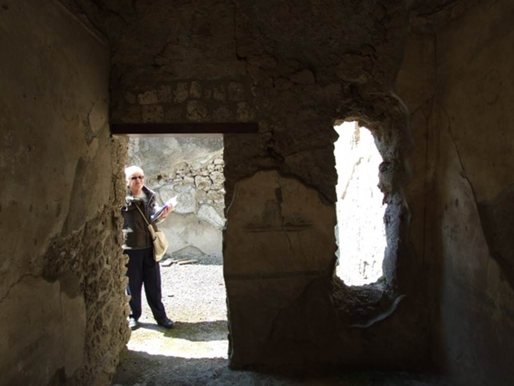 I.10.8 Pompeii. March 2009. Room 3, west wall with doorway from cubiculum into oecus/exedra. 