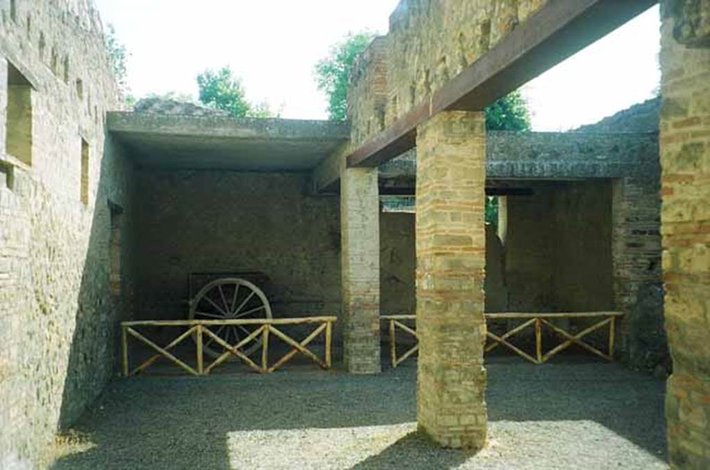 I.10.14 Pompeii. June 2010. Cart in stable. Photo courtesy of Rick Bauer.