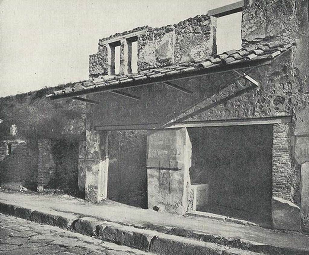 I.11.3 Pompeii, on left, c.1920. Entrance doorways, with I.11.2, on right. 
Upper storey windows are visible.

